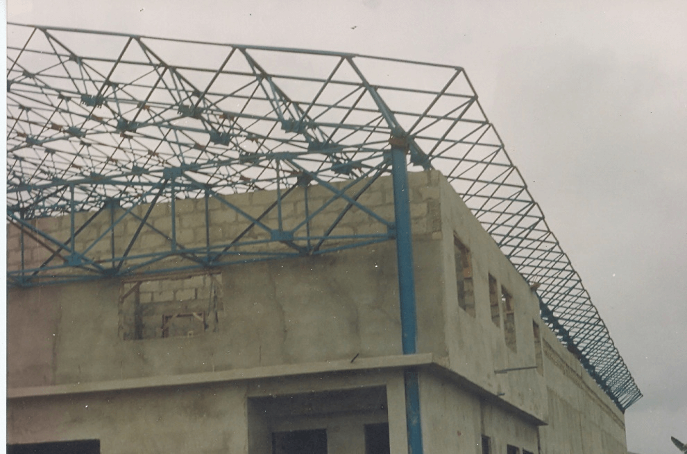 C. Side / End view of the Roof Structure showing the connection to Stanchion support from outside along with a view of the stabilizing box girder.
                            .